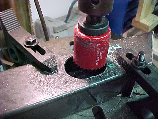 Hole sawing the body mnt slots